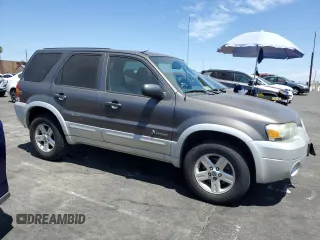 2005 Ford Escape Hybrid with VIN 1FMCU95H35KC95221, listed as a Copart auction lot 67789924 with 169,260 mi miles and Clean Title. Bid and sale history available at carsss.com. Image 4.