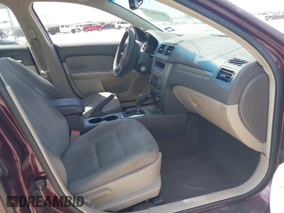 2012 Ford Fusion SE z VIN 3FAHP0HA1CR436376, wystawiony jako IAAI lot #41746291 z przebiegiem 148 748 mil mil oraz . Historia ofert i sprzedaży dostępna na DreamBid. Obrazek 5.