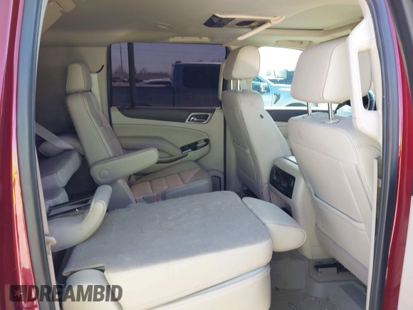 2020 GMC Yukon XL Denali with VIN 1GKS1HKJ3LR238701, listed as a IAAI auction lot 41724274 with 107,323 mi miles and . Bid and sale history available at DreamBid. Image 8.