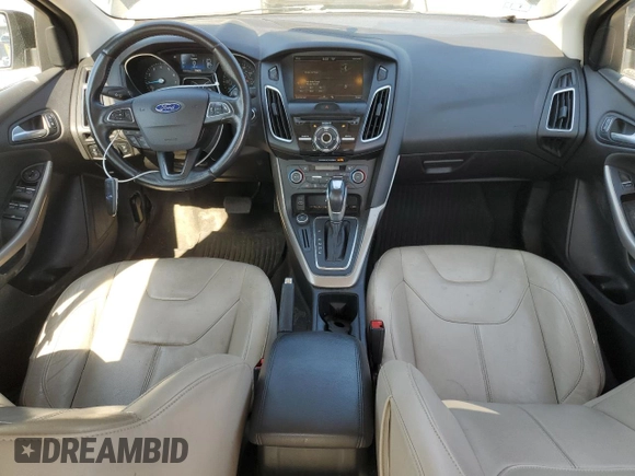 2015 Ford Focus Titanium with VIN 1FADP3J2XFL200489, listed as a Copart auction lot 56443215 with 139,990 mi miles and Clean title. Bid and sale history available at DreamBid. Image 8.
