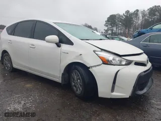 2017 Toyota Prius v Two with VIN JTDZN3EU0HJ059027, listed as a IAAI auction lot 41558868 with 215,604 mi miles. Bid and sale history available at carsss.com. Image 1.