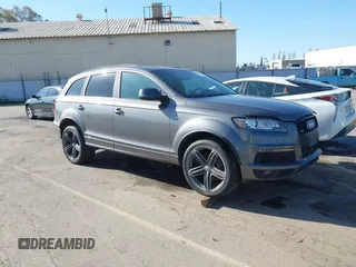2014 Audi Q7 3.0T S line Prestige with VIN WA1DGAFE2ED009086, listed as a IAAI auction lot 41824179 with 136,899 mi miles. Bid and sale history available at carsss.com. Image 1.