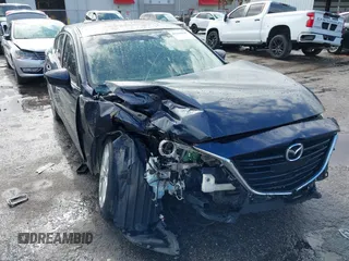2015 Mazda 3 S Grand Touring z VIN JM1BM1W35F1238188, wystawiony jako IAAI lot #41206030 z przebiegiem 316 542 mil mil oraz . Historia ofert i sprzedaży dostępna na DreamBid. Obrazek 6.