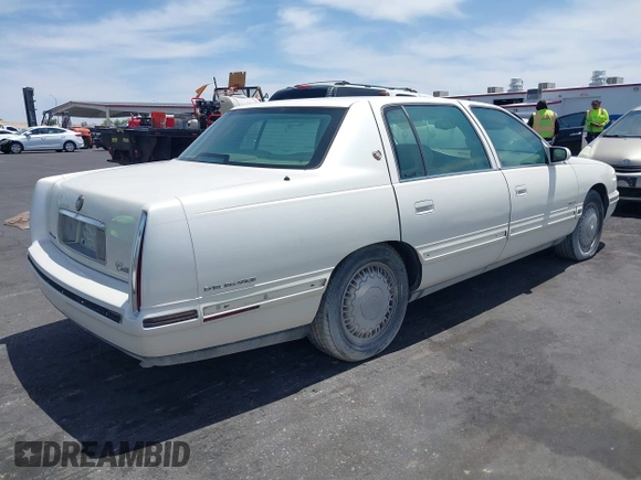 1999 Cadillac DeVille DHS z VIN 1G6KE54Y3XU714363, wystawiony jako IAAI lot #42257217 z przebiegiem 287 542 mil mil oraz . Historia ofert i sprzedaży dostępna na DreamBid. Obrazek 6.