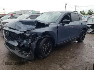 2023 Mazda CX-5 S Carbon Edition z VIN JM3KFBCM5P0257514, wystawiony jako Copart lot #66966084 z przebiegiem 7 597 mil mil oraz Szkoda całkowita • Salvage title. Historia ofert i sprzedaży dostępna na DreamBid. Obrazek 1.