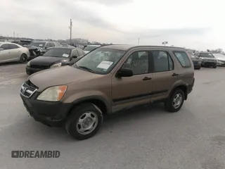 2004 Honda CR-V LX with VIN JHLRD78454C024250, listed as a IAAI auction lot 41227320 with 317,109 mi miles and . Bid and sale history available at carsss.com. Image 2.