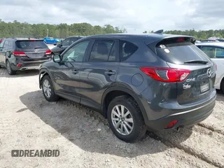 2016 Mazda CX-5 Touring with VIN JM3KE2CYXG0647921, listed as a IAAI auction lot 41948068 with 133,733 mi miles and . Bid and sale history available at DreamBid. Image 3.