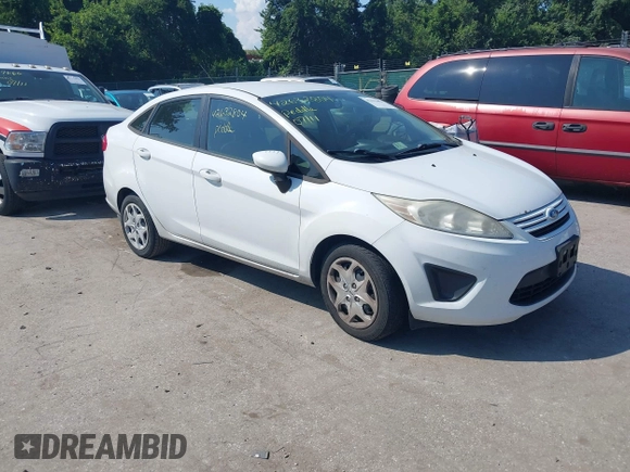 2013 Ford Fiesta S with VIN 3FADP4AJ7DM184180, listed as a IAAI auction lot 42632804 with 176,729 mi miles and . Bid and sale history available at DreamBid. Image 1.