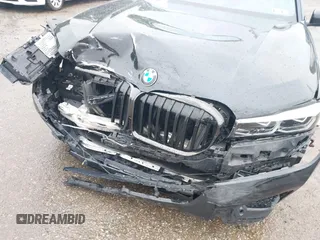 2021 BMW 7 Series 740i with VIN WBA7T2C0XMCF73506, listed as a IAAI auction lot 42335145 with 35,838 mi miles and . Bid and sale history available at DreamBid. Image 6.
