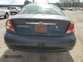 2000 Ford Taurus SE with VIN 1FAFP53U9YG285971, listed as a Copart auction lot 78138984 with 182,135 mi miles and Salvage Title. Bid and sale history available at DreamBid. Image 6.