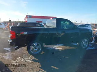 2009 Chevrolet Silverado 1500 with VIN 1GCEK24089Z112740, listed as a IAAI auction lot 40865985 with 209,446 mi miles and . Bid and sale history available at DreamBid. Image 13.