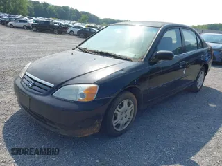 2001 Honda Civic LX z VIN 2HGES16521H558942, wystawiony jako IAAI lot #42409480 z przebiegiem 230 909 mil mil oraz . Historia ofert i sprzedaży dostępna na DreamBid. Obrazek 6.
