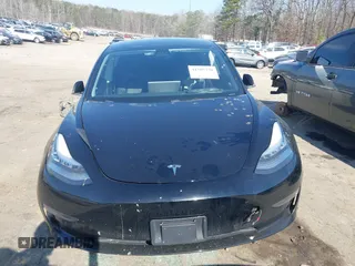 2020 Tesla Model 3 Standard Range Plus with VIN 5YJ3E1EA0LF660759, listed as a IAAI auction lot 41505250 with 63,322 mi miles and . Bid and sale history available at DreamBid. Image 12.