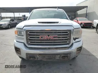 2018 GMC Sierra 2500HD с VIN 1GT12REY7JF202463, выставлен на аукционе Copart как лот 51239625 с пробегом 179 006 миль миль и Чистый • Clean title. История ставок и продаж доступна на DreamBid. Изображение 5.