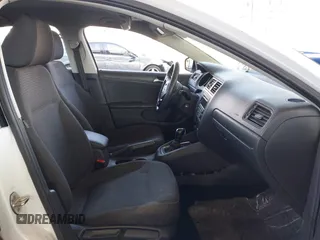 2015 Volkswagen Jetta Sedan 2.0L S with VIN 3VW2K7AJ3FM253125, listed as a IAAI auction lot 41535632 with 103,953 mi miles. Bid and sale history available at carsss.com. Image 5.