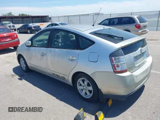 2005 Toyota Prius z VIN JTDKB20U657012346, wystawiony jako IAAI lot #42275718 z przebiegiem 180 851 mil mil oraz . Historia ofert i sprzedaży dostępna na DreamBid. Obrazek 3.