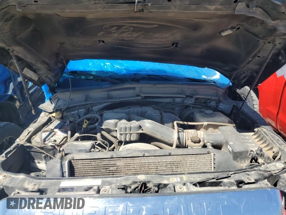 2015 Ford F-250 Lariat with VIN 1FT7W2B6XFEA59756, listed as a Copart auction lot 55465705 with 183,538 mi miles and Salvage title. Bid and sale history available at DreamBid. Image 11.