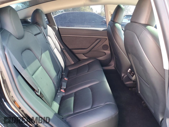 2023 Tesla Model 3 z VIN 5YJ3E1EA4PF706521, wystawiony jako Copart lot #49295465 z przebiegiem 25 026 mil mil oraz Szkoda całkowita • Salvage title. Historia ofert i sprzedaży dostępna na DreamBid. Obrazek 11.