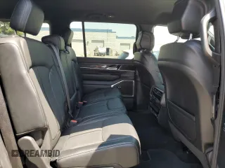 2022 Jeep Wagoneer Series II z VIN 1C4SJUBT3NS165413, wystawiony jako Copart lot #55669825 z przebiegiem 12 693 mil mil oraz Szkoda całkowita • Salvage title. Historia ofert i sprzedaży dostępna na DreamBid. Obrazek 11.