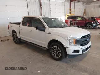 2019 Ford F-150 XL with VIN 1FTEW1EP7KFB95451, listed as a IAAI auction lot 42411988 with 99,987 mi miles and . Bid and sale history available at DreamBid. Image 1.