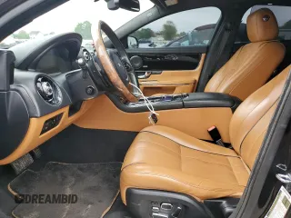 2013 Jaguar XJ Portfolio with VIN SAJWJ2GD0D8V44292, listed as a Copart auction lot 57073775 with 100,458 mi miles and Salvage Title. Bid and sale history available at DreamBid. Image 7.