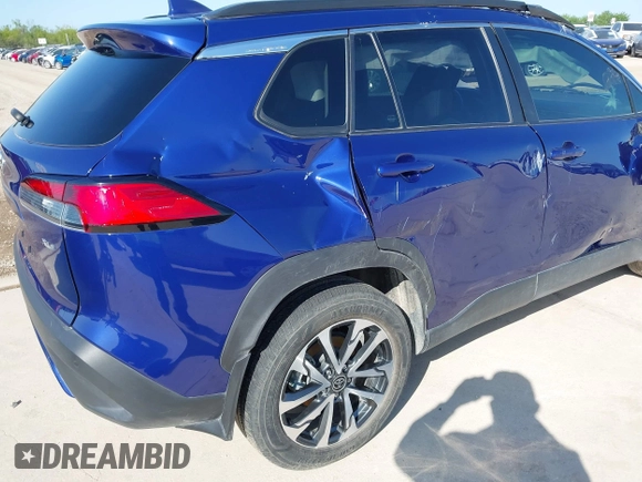 2022 Toyota Corolla Cross XLE with VIN 7MUDAAAG8NV027585, listed as a IAAI auction lot 41781177 with 36,841 mi miles and . Bid and sale history available at DreamBid. Image 13.