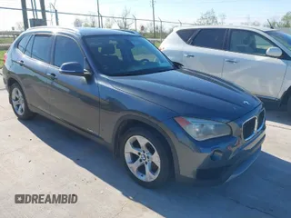 2014 BMW X1 sDrive28i with VIN WBAVM1C57EVW47767, listed as a IAAI auction lot 41867313 with 90,431 mi miles. Bid and sale history available at carsss.com. Image 1.