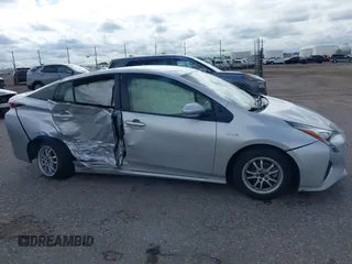 2017 Toyota Prius Two with VIN JTDKBRFU0H3037920, listed as a IAAI auction lot 42356304 with 155,485 mi miles and . Bid and sale history available at DreamBid. Image 13.