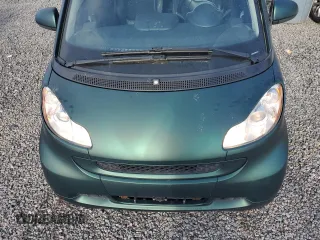 2009 Smart fortwo Passion z VIN WMEEK31X89K289001, wystawiony jako Copart lot #51781925 z przebiegiem 79 742 mil mil oraz Szkoda całkowita • Salvage title. Historia ofert i sprzedaży dostępna na DreamBid. Obrazek 12.