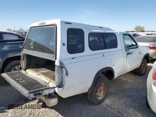 1998 Nissan Frontier XE with VIN 1N6DD21S9WC357098, listed as a Copart auction lot 77652604 with Not provided miles and Clean title. Bid and sale history available at DreamBid. Image 3.