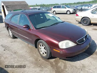 2000 Mercury Sable z VIN 1MEFM58U8YG617862, wystawiony jako IAAI lot #42259045 z przebiegiem 147 644 mil mil oraz . Historia ofert i sprzedaży dostępna na DreamBid. Obrazek 1.