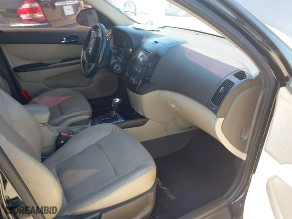 2012 Hyundai Elantra Touring SE with VIN KMHDC8AEXCU139403, listed as a IAAI auction lot 41862954 with 116,661 mi miles. Bid and sale history available at carsss.com. Image 5.