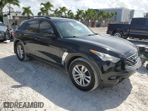 2014 Infiniti QX70 z VIN JN8CS1MU4EM451883, wystawiony jako Copart lot #61744725 z przebiegiem 60 393 mil mil oraz Czysty tytuł • Clean title. Historia ofert i sprzedaży dostępna na DreamBid. Obrazek 4.