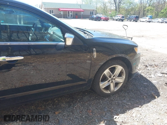 2012 Lincoln MKZ with VIN 3LNHL2GC2CR801499, listed as a IAAI auction lot 42144202 with 168,294 mi miles. Bid and sale history available at carsss.com. Image 13.