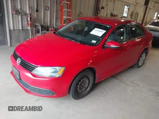 2014 Volkswagen Jetta SE z VIN 3VWD17AJ5EM249216, wystawiony jako IAAI lot #42096885 z przebiegiem 188 166 mil mil oraz . Historia ofert i sprzedaży dostępna na DreamBid. Obrazek 2.