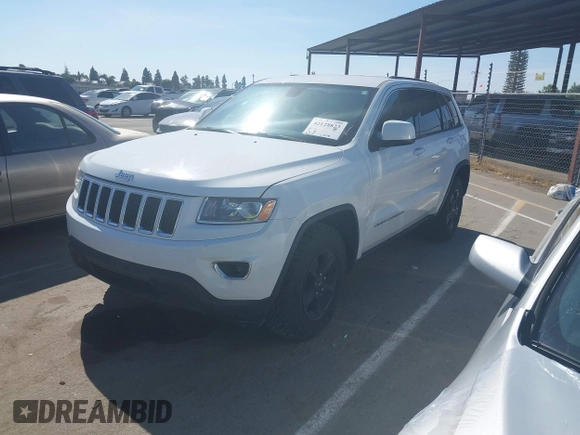 2014 Jeep Grand Cherokee Laredo with VIN 1C4RJFAG9EC334021, listed as a IAAI auction lot 42128823 with 161,741 mi miles. Bid and sale history available at carsss.com. Image 17.