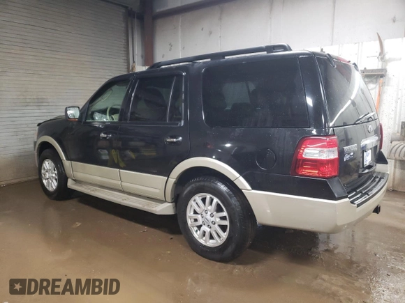 2010 Ford Expedition Eddie Bauer with VIN 1FMJU1J55AEB59198, listed as a Copart auction lot 52499065 with 130,865 mi miles and Salvage title. Bid and sale history available at DreamBid. Image 2.
