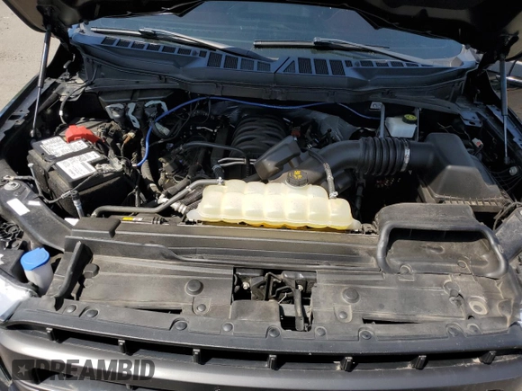 2022 Ford F-150 XL z VIN 1FTFW1E5XNFA77045, wystawiony jako Copart lot #59955435 z przebiegiem 36 605 mil mil oraz Szkoda całkowita • Salvage title. Historia ofert i sprzedaży dostępna na DreamBid. Obrazek 11.