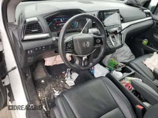 2022 Honda Odyssey Touring z VIN 5FNRL6H89NB039089, wystawiony jako Copart lot #81227004 z przebiegiem 50 881 mil mil oraz Szkoda całkowita • Salvage title. Historia ofert i sprzedaży dostępna na DreamBid. Obrazek 8.
