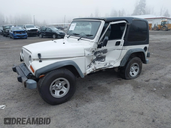 2006 Jeep Wrangler Sport Right Hand Drive with VIN 1J4F449S16P709895, listed as a IAAI auction lot 41349311 with 157,125 mi miles. Bid and sale history available at carsss.com. Image 20.