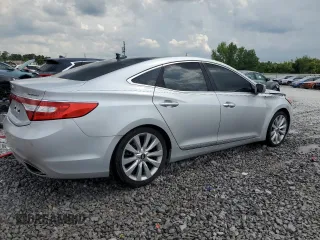 2014 Hyundai Azera Limited with VIN KMHFH4JG1EA376452, listed as a Copart auction lot 59703095 with 124,801 mi miles and Salvage title. Bid and sale history available at DreamBid. Image 3.