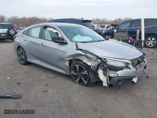 2017 Honda Civic Sedan Touring with VIN 2HGFC1F95HH638797, listed as a IAAI auction lot 40887826 with 119,103 mi miles. Bid and sale history available at carsss.com. Image 1.