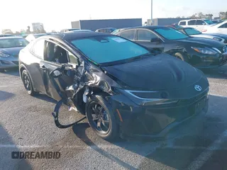 2024 Toyota Prius LE z VIN JTDACAAU8R3046786, wystawiony jako IAAI lot #42249270 z przebiegiem 7862 mil mil oraz . Historia ofert i sprzedaży dostępna na DreamBid. Obrazek 1.