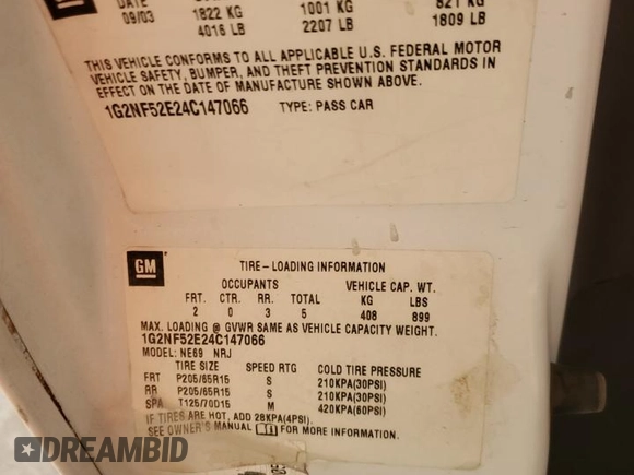 2004 Pontiac Grand Am SE1 with VIN 1G2NF52E24C147066, listed as a Copart auction lot 84556084 with 138,490 mi miles and Salvage Title. Bid and sale history available at carsss.com. Image 14.