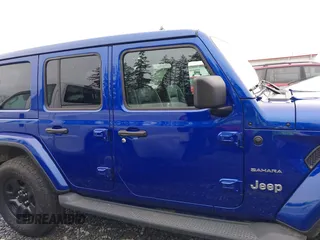 2019 Jeep Wrangler Unlimited Sahara with VIN 1C4HJXEG2KW609315, listed as a IAAI auction lot 41144404 with 55,266 mi miles and . Bid and sale history available at DreamBid. Image 13.