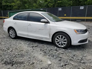 2012 Volkswagen Jetta SE z VIN 3VWDX7AJ7CM077878, wystawiony jako Copart lot #57782295 z przebiegiem 109 308 mil mil oraz Szkoda całkowita • Salvage title. Historia ofert i sprzedaży dostępna na DreamBid. Obrazek 4.