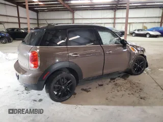 2015 MINI Countryman with VIN WMWZB3C52FWR44105, listed as a Copart auction lot 86780484 with Not Provided miles and Salvage Title. Bid and sale history available at DreamBid. Image 3.