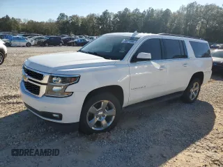 2019 Chevrolet Suburban LT with VIN 1GNSCHKC8KR258665, listed as a Copart auction lot 50071595 with 127,608 mi miles and Salvage Title. Bid and sale history available at DreamBid. Image 1.