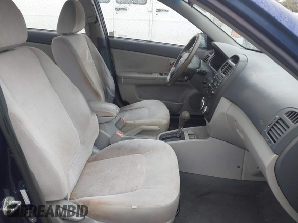 2009 Kia Spectra LX z VIN KNAFE221X95619246, wystawiony jako IAAI lot #41739339 z przebiegiem Nie podano mil oraz . Historia ofert i sprzedaży dostępna na DreamBid. Obrazek 5.