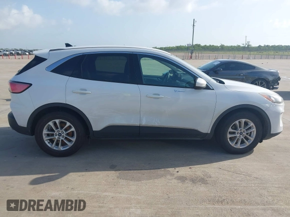 2020 Ford Escape SE z VIN 1FMCU0G67LUA10190, wystawiony jako IAAI lot #42533228 z przebiegiem 135 961 mil mil oraz . Historia ofert i sprzedaży dostępna na DreamBid. Obrazek 13.